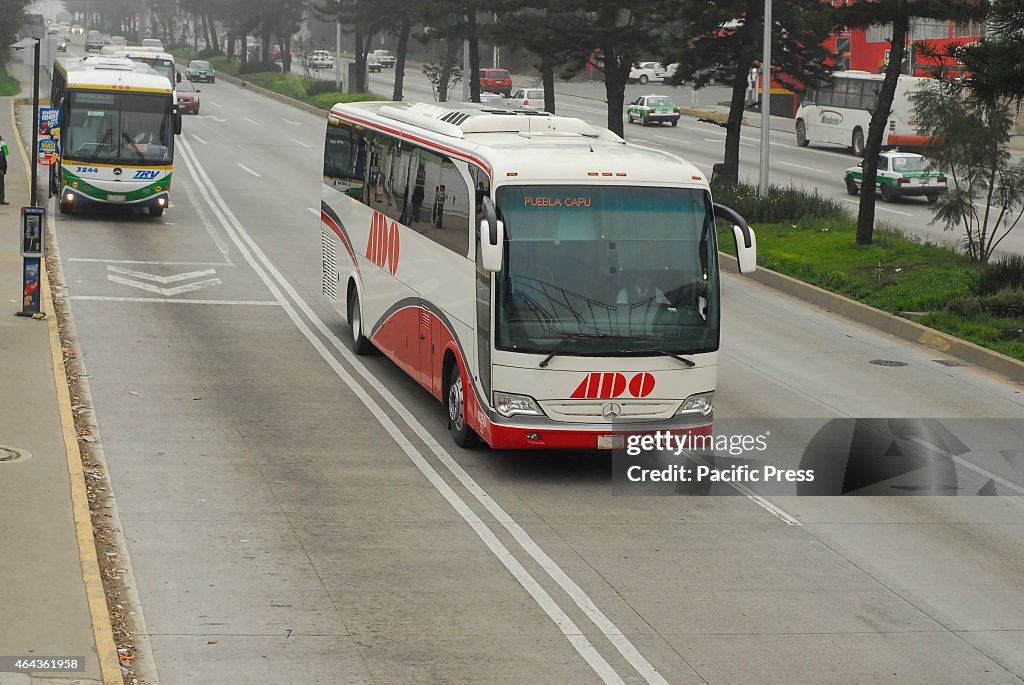 The bus of Buses Orient Line (ADO) with 25 passengers,...