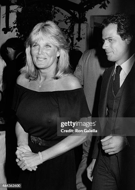 George Santo Pietro and Linda Evans attend Irving Lazar Oscar Party on March 31, 1981 at Bistro Gardens in Beverly Hills, California.