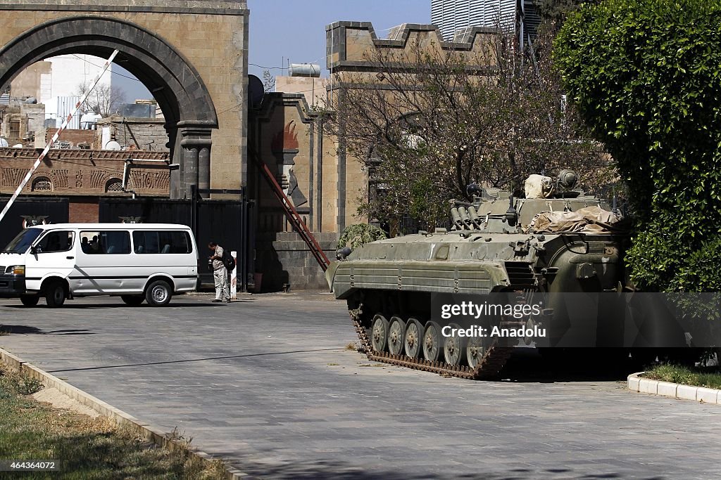 Houthi militants take security measures around Presidential Palace in Sanaa