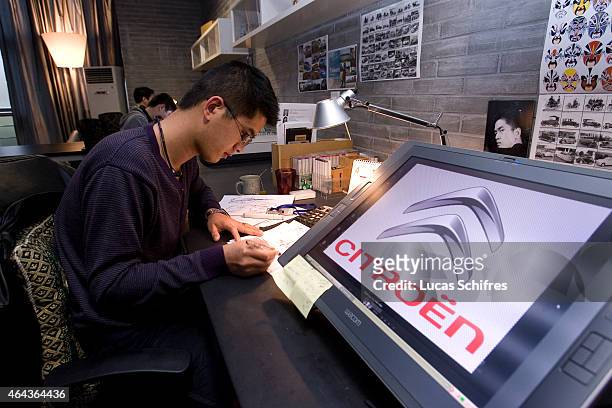 April 9: A Citroen car designer works in PSA Peugeot Citroen China Tech Center on April 9, 2010 in the outskirts of Shanghai, China.