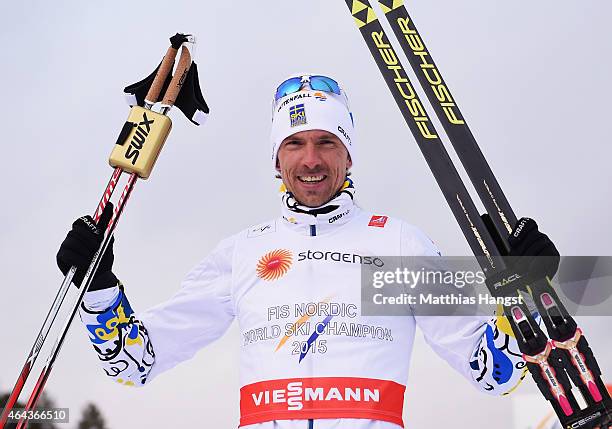 Johan Olsson of Sweden celebrates winning the gold medal in the Men's 15km Cross-Country during the FIS Nordic World Ski Championships at the Lugnet...