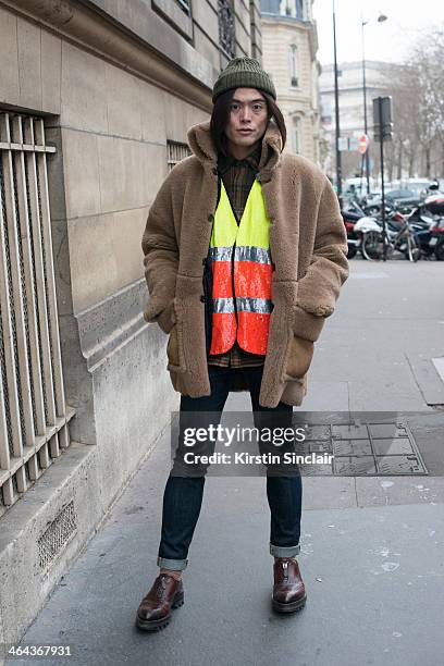 Fashion Writer Yu Masui wears an Ashish sequin vest day 2 of Paris Haute Couture Fashion Week Spring/Summer 2014, on January 21, 2014 in Paris,...