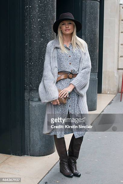 Jewellery designer Yana Raskovalova wears a Dior jacket, Ulyana Sergeenko dress, boots and bag and a Maison Michel hat day 2 of Paris Haute Couture...