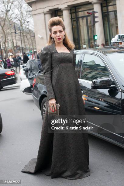 Artist Lidia Metelskaya wears a Ulyana Sergeenko dress and vintage bag day 2 of Paris Haute Couture Fashion Week Spring/Summer 2014, on January 21,...