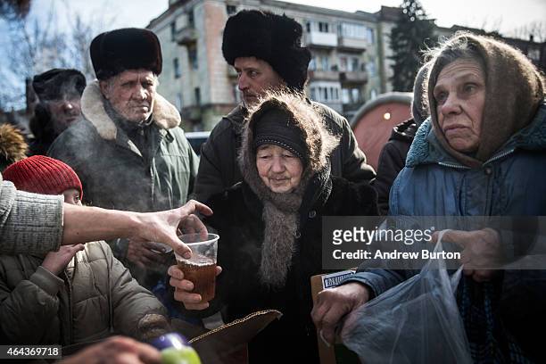 Russian backed rebels serve hot tea to civilians on February 25, 2015 in Debaltseve, Ukraine. After approximately one month of fighting, Russian...