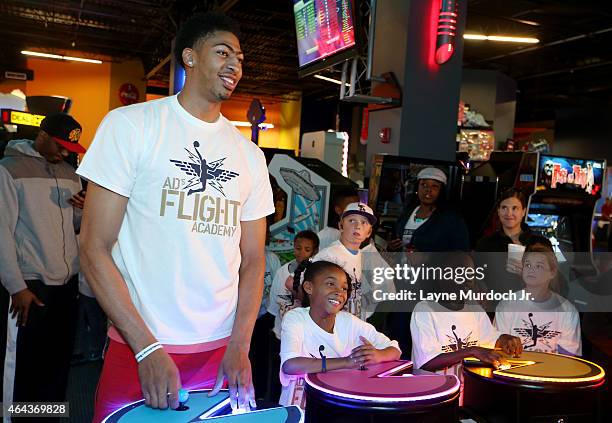 Metairie, LA Anthony Davis of the New Orleans Pelicans participates in his FLIGHT Academy's gaming activity on February 24, 2015 at Laser Tag in...