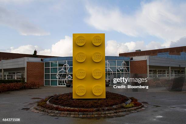 Toy brick artwork stands outside the entrance to the Lego A/S factory in Billund, Denmark, on Wednesday, Feb. 25, 2015. Lego said full-year revenue...