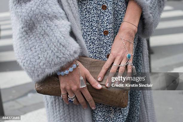 Jewellery designer Yana Raskovalova wears a Dior jacket, Ulyana Sergeenko dress and bag with her own design jewellery day 2 of Paris Haute Couture...