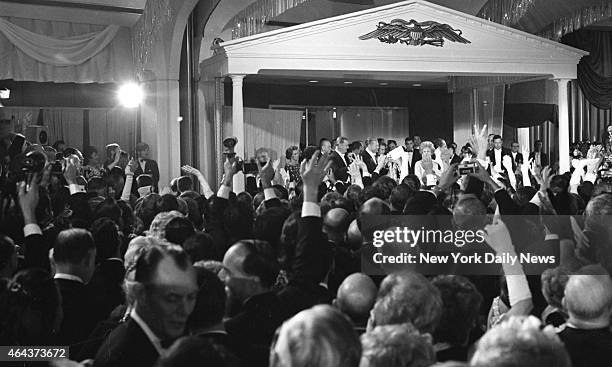 President Richard Nixon and First Lady Pat Nixon Cheers greet the arrival of presidential party at inaugural ball in the Washington Hilton. The...