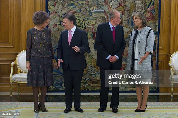 King Juan Carlos of Spain and Queen Sofia of Spain receive Colombian President Juan Manuel Santos Calderon and wife Maria Clemencia Rodriguez de...