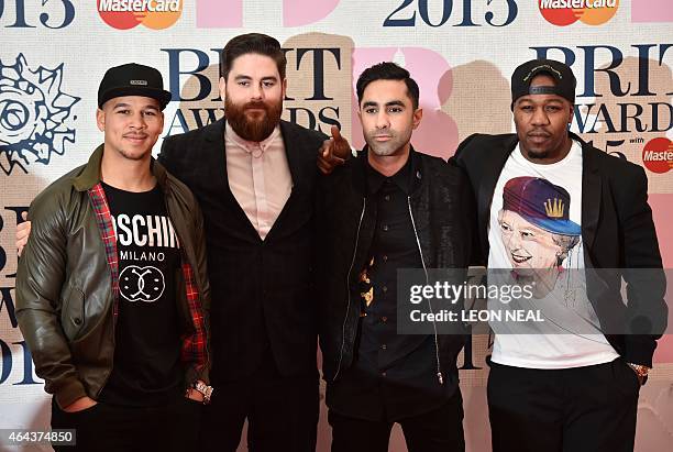 Piers Agget , Amir Amor , Kesi Dryden and DJ Locksmith of British band Rudimental pose on the red carpet to attend the BRIT Awards 2015 in London on...