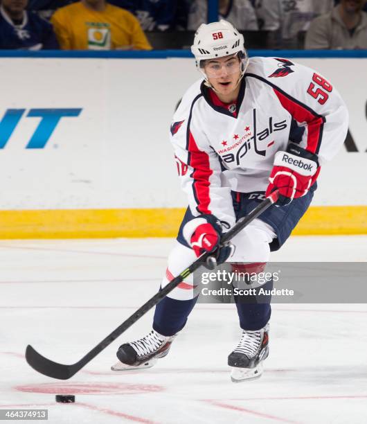 Connor Carrick of the Washington Capitals skates against the Tampa Bay Lightning at the Tampa Bay Times Forum on January 9, 2014 in Tampa, Florida.