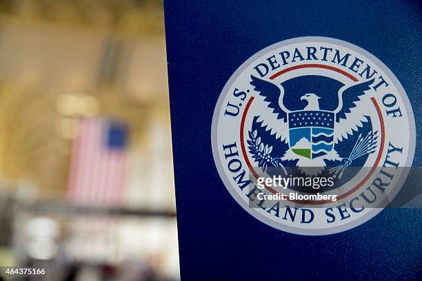 Department of Homeland Security sign stands at Ronald Reagan National Airport in Washington, D.C., U.S., on Wednesday, Feb. 25, 2015. Financing for...