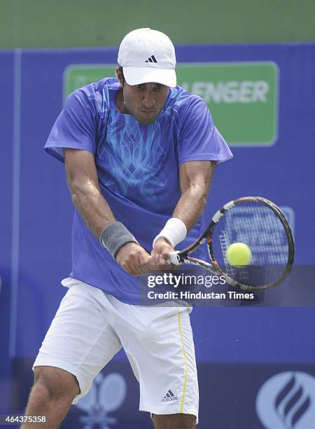 Indian tennis player Yuki Bhambri in action against Maldovian player Radu Albot during Pre-quarterfinals match of ATP Kolkata Open 2015 match on...