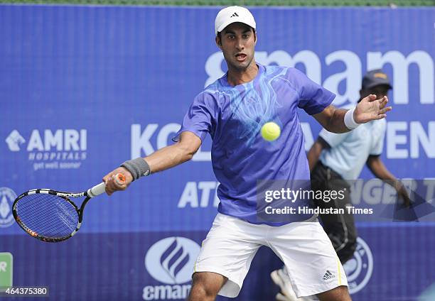 Indian tennis player Yuki Bhambri in action against Maldovian player Radu Albot during Pre-quarterfinals match of ATP Kolkata Open 2015 match on...