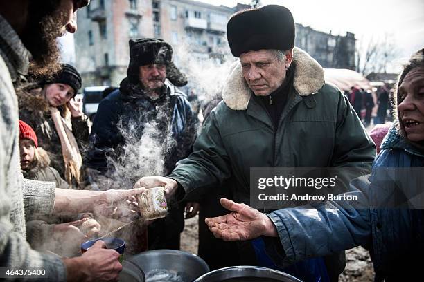 Russian backed rebels serve hot tea to civilians on February 25, 2015 in Debaltseve, Ukraine. After approximately one month of fighting, Russian...