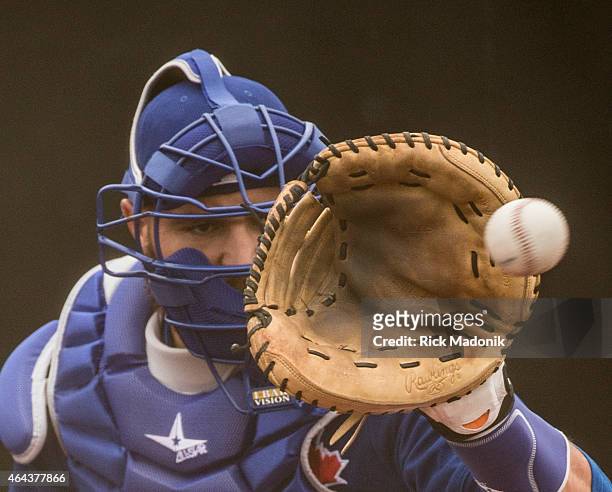 Catcher Russell Martin gets use to catching the knuckleball from RA Dickey. The team worked out at the Bobby Mattock Training Facility in Dunedin as...