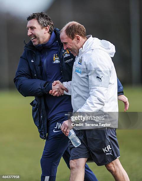 Newcastle Under 18 Coach Kevin Richardson shakes hands with Manchester City U18 Manager Jason Wilcox during the Barclays Premier League U18 match...