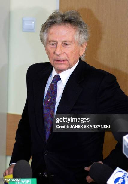 French-Polish film director Roman Polanski leaves the court after 9 hours hearing at the regional court in Krakow on February 25, 2015. The court is...