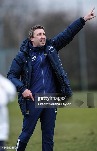 Manchester City U18 Manager Jason Wilcox stands pitch side and points instructions during the Barclays Premier League U18 match between Newcastle...