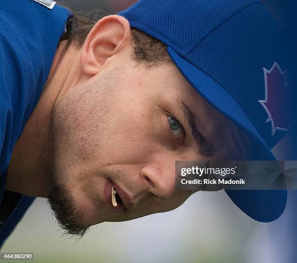 Pitcher Brett Cecil spits out some seeds during the warm up at the Bobby Mattock Training Facility in Dunedin as the Jays continue spring training...