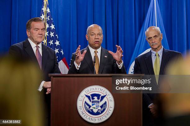 Jeh Johnson, U.S. Secretary of Homeland Security , center, speaks during a news conference with former secretaries of Homeland Security Tom Ridge,...