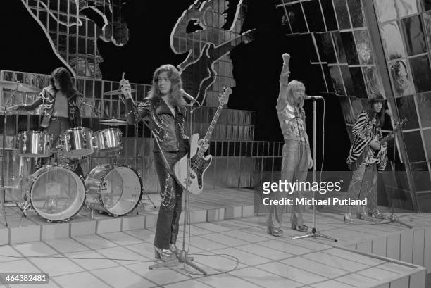British glam rock group Sweet performing on the Christmas Day edition of the BBC TV music show 'Top Of The Pops', broadcast 25th December 1973. Left...