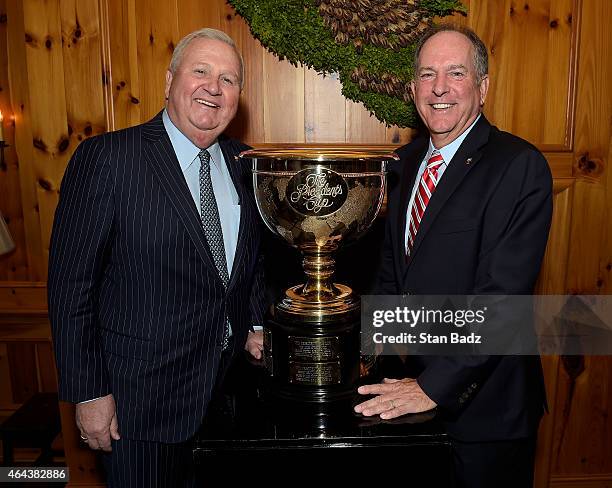 Quail Hollow Club President Johnny Harris and 2015 U.S. Team Captain Jay Haas pose with the Presidents Cup Trophy following the announcement that...