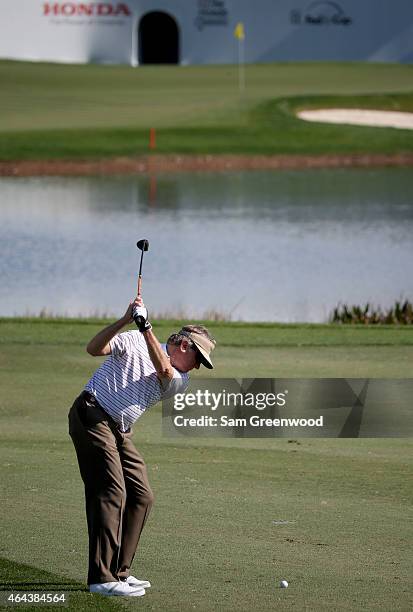 South Carolina head football coach Steve Spurrier hits a shot during the pro-am round prior to The Honda Classic at PGA National Resort and Spa on...