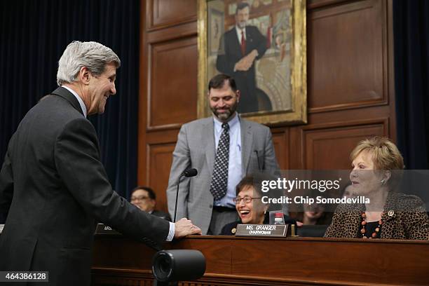 Secretary of State John Kerry talks with the House Appropriations Committee's State, Foreign Operations and Related Programs Subcommittee Chair Kay...