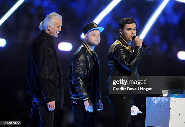 Jimmy Page presents Best British Group award to Royal Blood on stage at the BRIT Awards 2015 at The O2 Arena on February 25, 2015 in London, England.