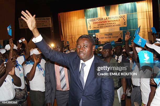 Togo's President Faure Gnassingbe waves to supporters during the Union for the Republic's national gathering in Kara on February 25, 2015. Togo's...