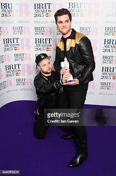 Ben Thatcher and Mike Kerr of Royal Blood,winners of Best British Group, pose in the winners room during the BRIT Awards 2015 at The O2 Arena on...
