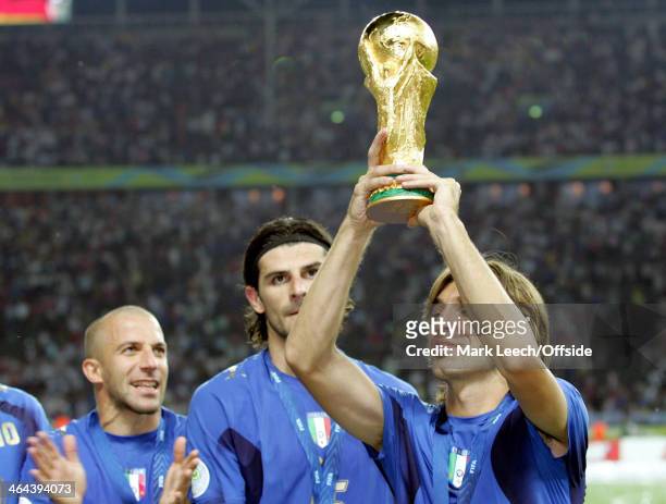 July 2006 - World Cup Final - Italy v France - Andrea Pirlo of Italy holds the World Cup trophy in the air.