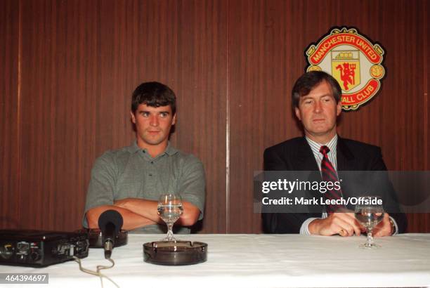 July 1993 - Manchester United Chairman Martin Edwards and Roy Keane sit together while answering questions from the media.