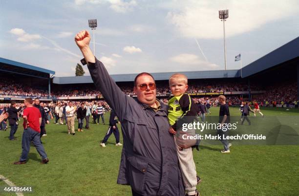 May 1999 - English Football League Division One - Queens Park Rangers v Crystal Palace - Two QPR fans, a father and his young boy, celebrate...