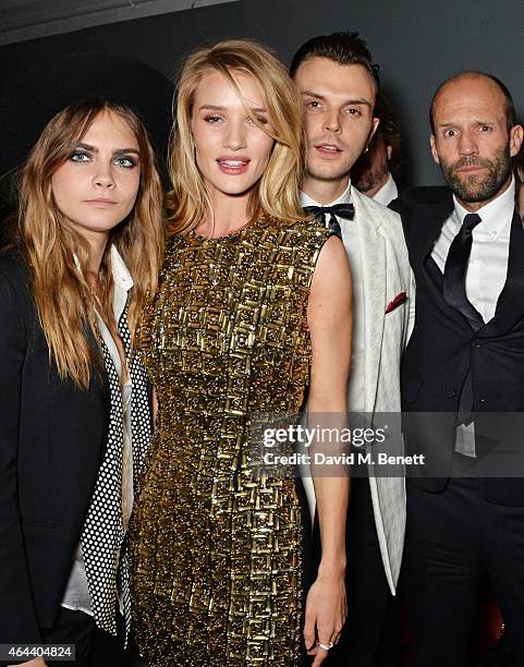 Cara Delevingne, Rosie Huntington-Whiteley, Theo Hutchcraft and Jason Statham attend the Universal Music Brits party at The Soho House Pop-Up on...