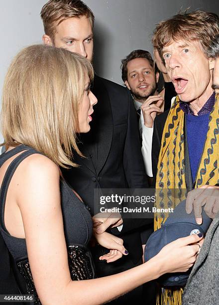 Taylor Swift, Calvin Harris and Sir Mick Jagger attend the Universal Music Brits party hosted by Bacardi at The Soho House Pop-Up on February 25,...