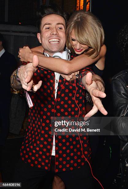 Nick Grimshaw and Taylor Swift attend the Universal Music Brits party hosted by Bacardi at The Soho House Pop-Up on February 25, 2015 in London,...