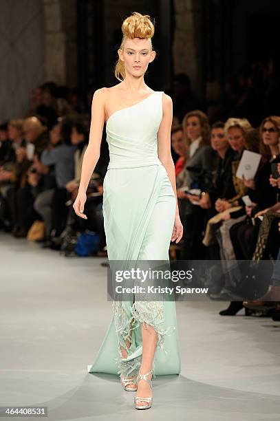 Model walks the runway during the Georges Chakra show as part of Paris Fashion Week Haute Couture Spring/Summer 2014 on January 22, 2014 in Paris,...