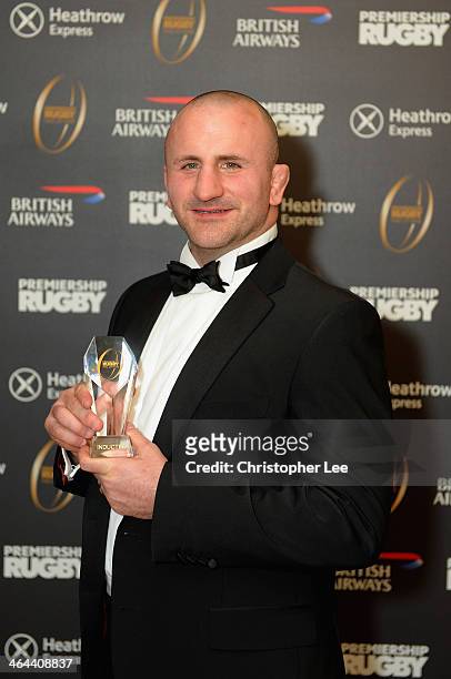 George Chuter poses for the camera with his Award for being Inducted into the Premiership Rugby Hall of Fame during the Premiership Rugby Hall of...