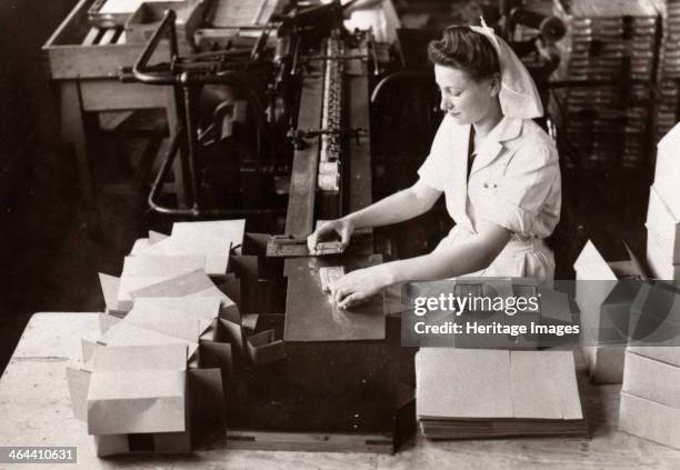 Woman packing Kit Kat into boxes, Rowntree factory, York, Yorkshire, 1949.