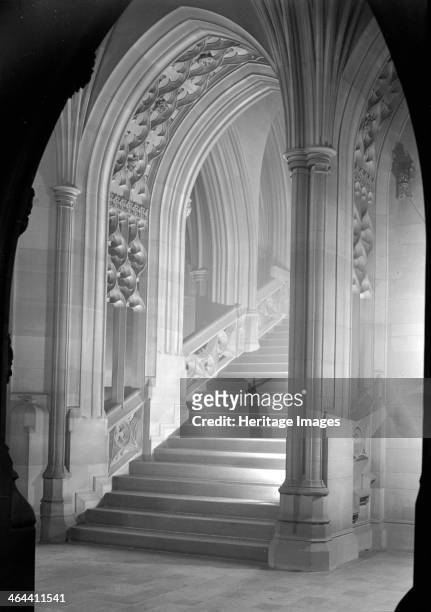 Staircase in the John Rylands Library, Deansgate, University of Manchester, 1942. It is an arched carved stone staircase decorated with quatrefoils...