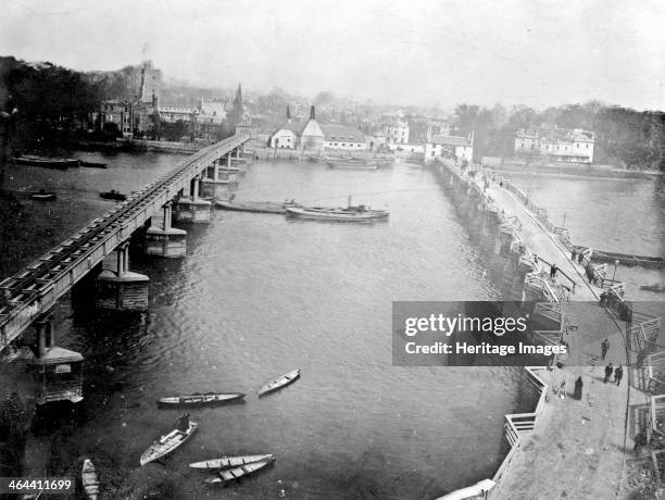 Putney Bridge, London, c1850-c1880. The first bridge over the River Thames between Putney and Fulham, seen here, was built in 1727-9. The Chelsea...