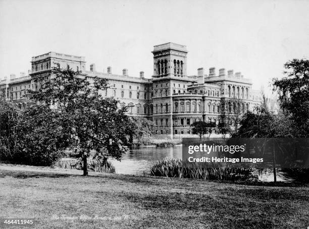 West front of the Foreign Office, Whitehall, London, after 1873. Viewed across a lake from St James's Park. The Government offices were designed by...