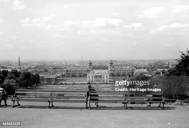 The Queen's House and Royal Naval Hospital Greenwich, from Greenwich Park, London, c1945-c1965. People on a park bench enjoy this famous view from...