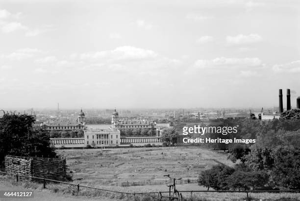 The Queen's House and Royal Naval Hospital , Greenwich, London, viewed from Greenwich Park, London, c1945-c1965. The lawns behind the House have been...