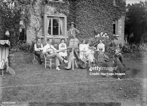 People playing music in a garden, c1896-c1920. A music party in the garden of an unidentified house in Monks Risborough, White Leaf, or Princes...