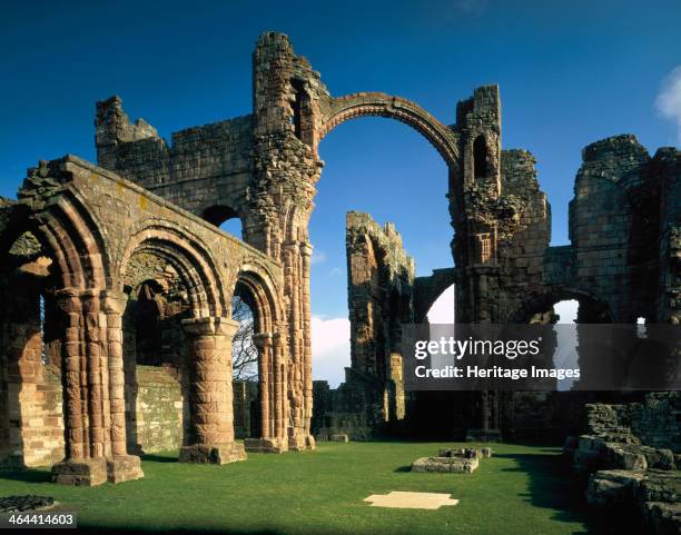 Nave in the priory church with decorated pillars, Lindisfarne Priory, Northumberland, 1988. The ruins of the priory church date from 1093-1140. A...