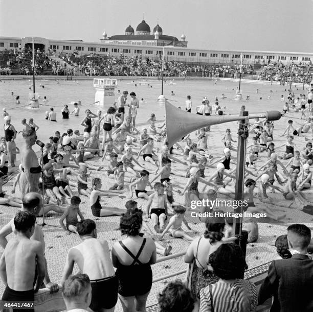 Children take part in an exercise class while their parents look on, Blackpool Lido, c1946-c1955. Blackpool Lido was opened in 1923. The distinctive...